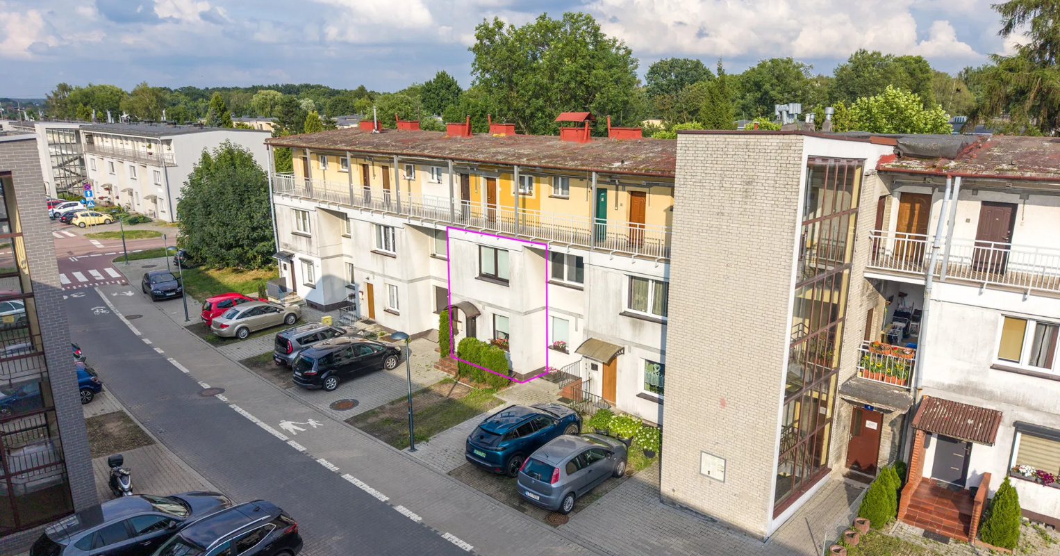 Mieszkanie Tychy - salon z wyjściem na ogródek